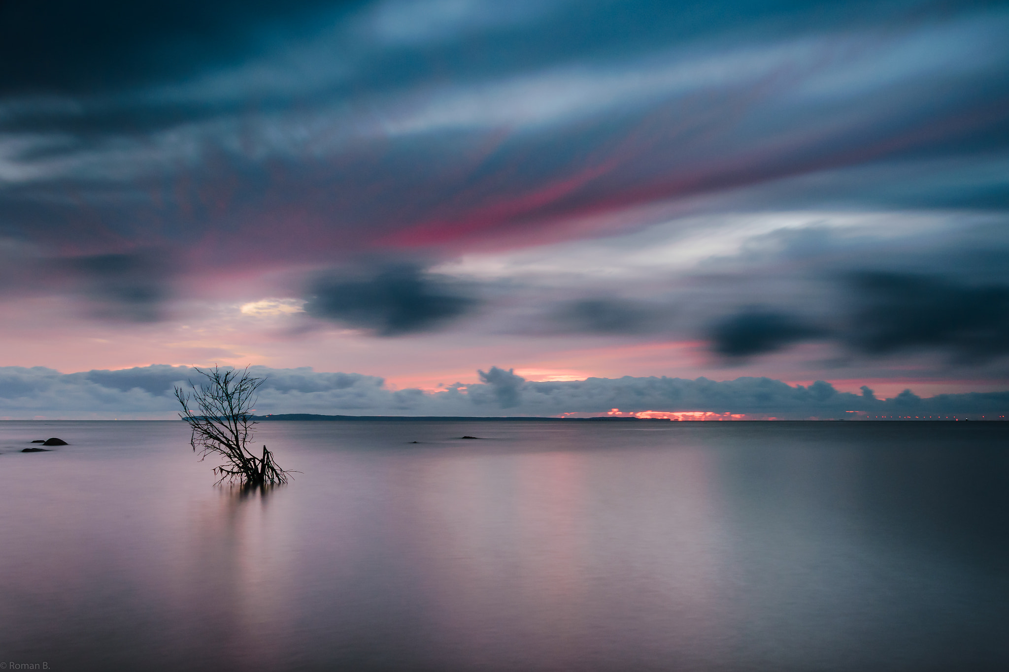 Calm sea and a blue-hour sky